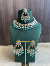 Load image into Gallery viewer, Aarohi Firozi Sky Blue Golden Polki Necklace Set with maangtikka
