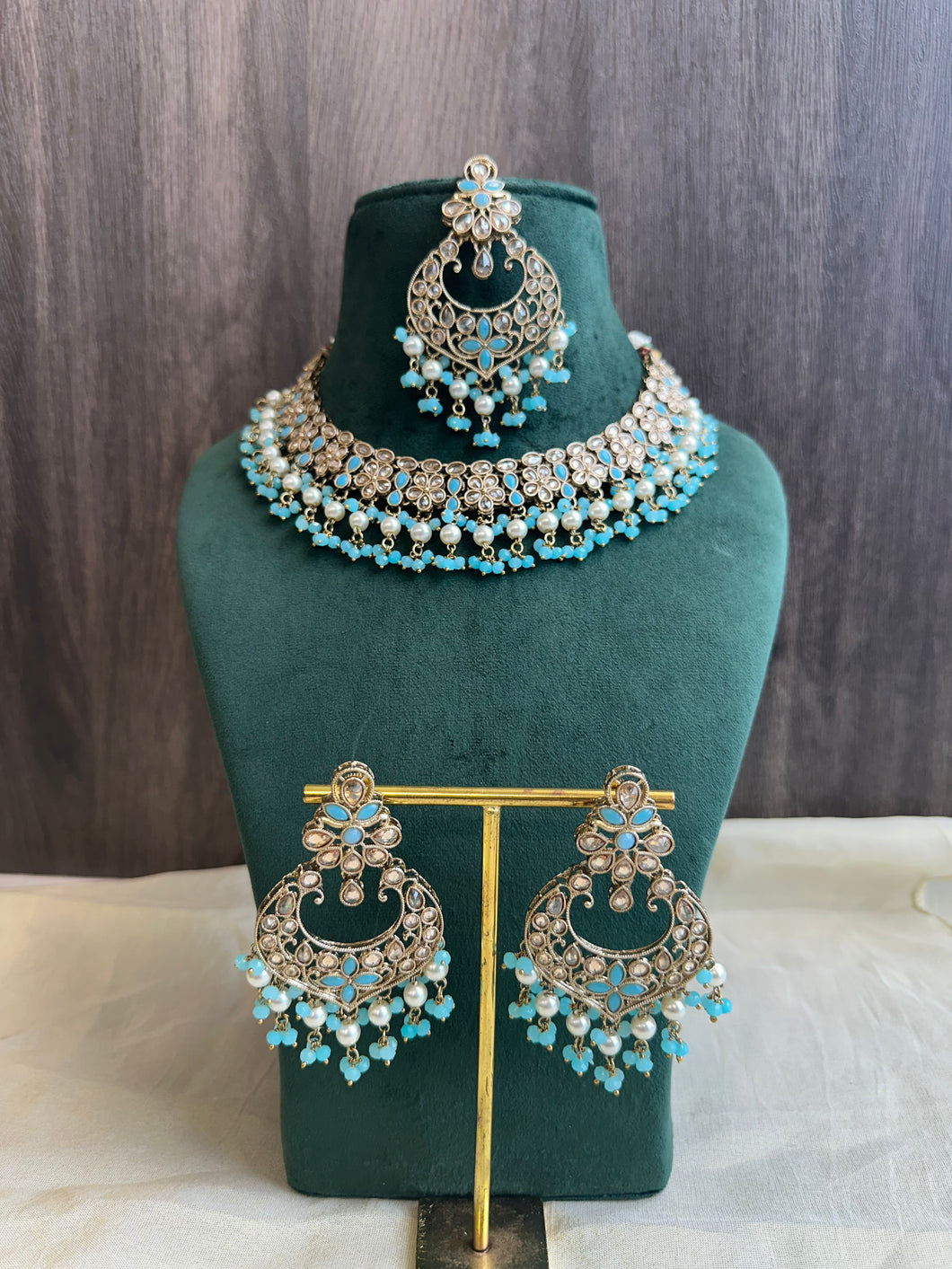 Aarohi Firozi Sky Blue Golden Polki Necklace Set with maangtikka