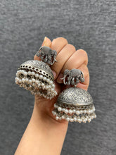 Load image into Gallery viewer, German silver lookalike Elephant Pearl Jhumka earrings

