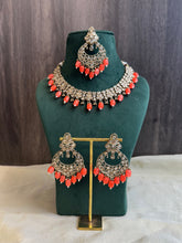 Load image into Gallery viewer, Aarohi Orange Golden Polki Necklace Set with maangtikka
