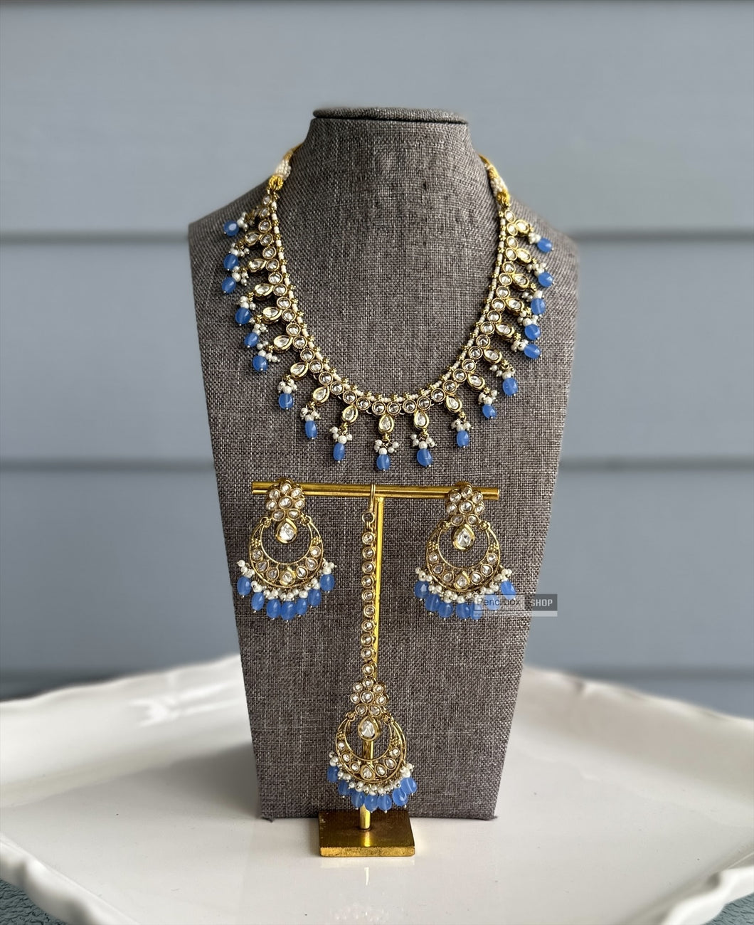 Radhs Light Blue Golden Kundan Polki Necklace Set with Maangtikka