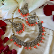 Load image into Gallery viewer, Aarohi Orange Golden Polki Necklace Set with maangtikka
