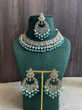 Load image into Gallery viewer, Aarohi Firozi Sky Blue Golden Polki Necklace Set with maangtikka
