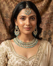 Load image into Gallery viewer, Aarohi Firozi Sky Blue Golden Polki Necklace Set with maangtikka
