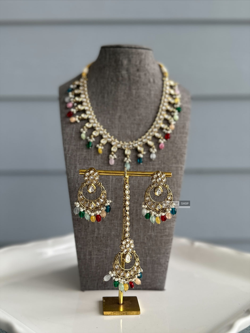 Radhs Multicolor Kundan Polki Necklace Set with Maangtikka