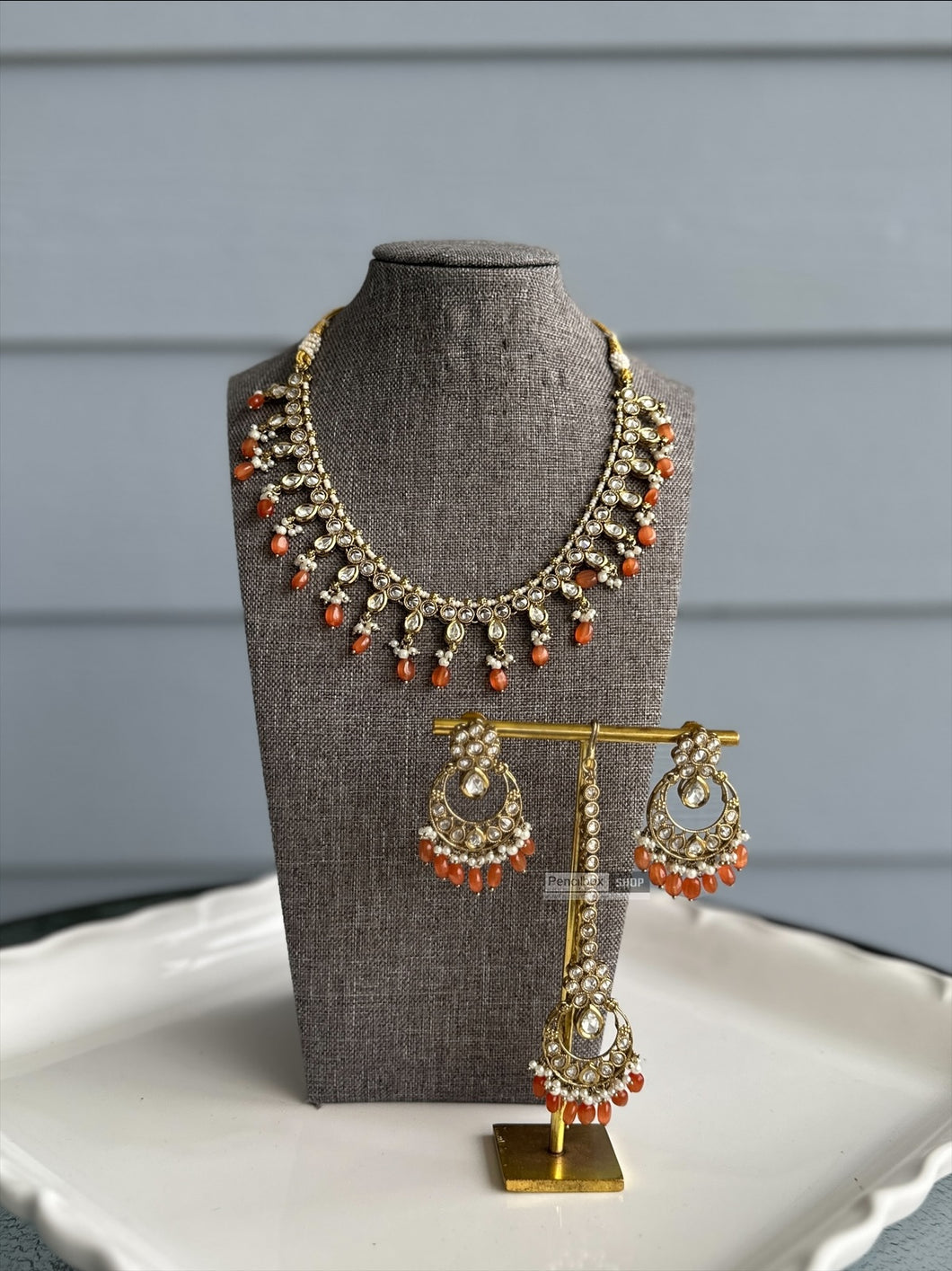 Radhs Light orange Kundan Polki Necklace Set with Maangtikka