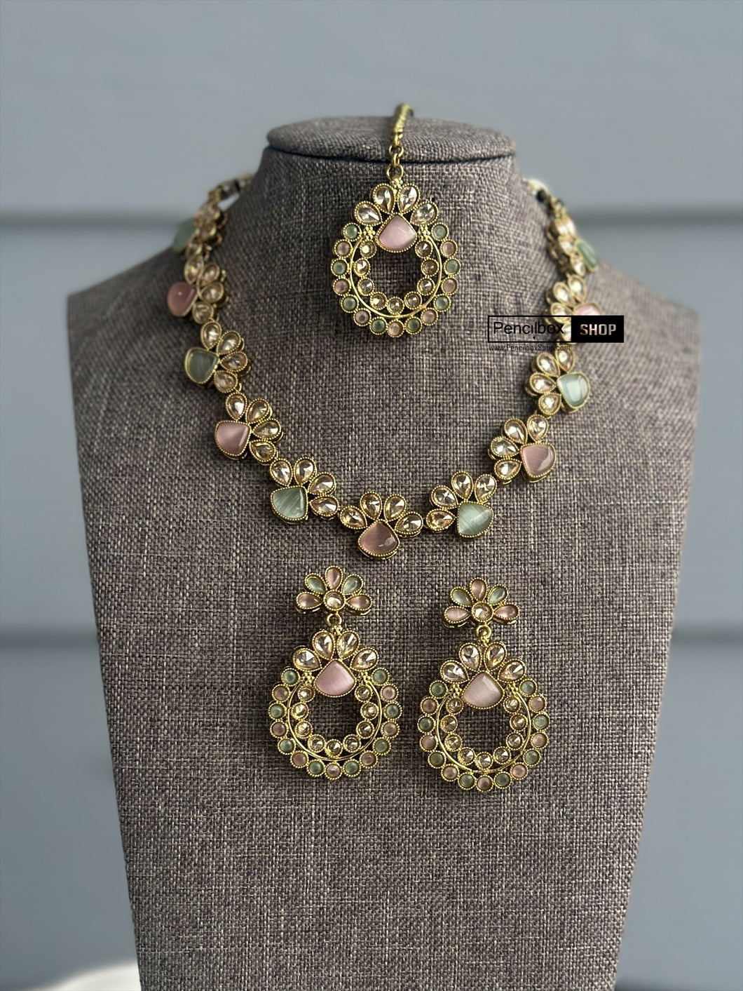 Mint pink Golden polki Single line Neckline Necklace set with jhumkas and maangtikka