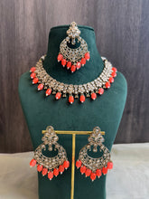 Load image into Gallery viewer, Aarohi Orange Golden Polki Necklace Set with maangtikka
