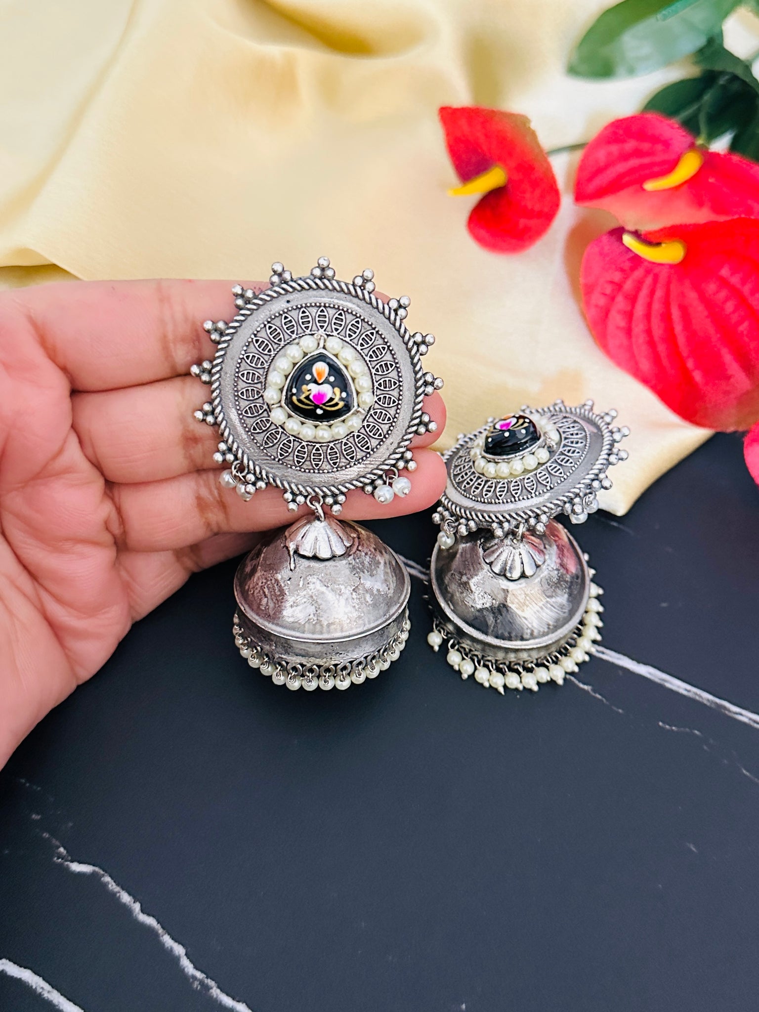 round design german silver oxidized earrings