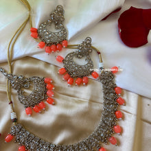 Load image into Gallery viewer, Aarohi Orange Golden Polki Necklace Set with maangtikka
