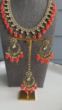 Load and play video in Gallery viewer, Radhs Orange Golden Kundan Polki Necklace Set with Maangtikka
