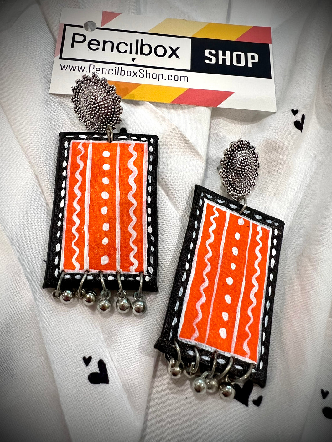 Handpainted orange Tribal Black White design earrings