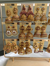 Load image into Gallery viewer, Temple earrings Golden Finish Mix collection of jhumka earrings
