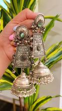 Load image into Gallery viewer, 92.5 silver Coated Three layered Glass Stone pearl Ghunghroo Jhumka Earrings
