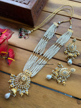 Load image into Gallery viewer, White Pearl Golden Beads long Kundan Statement Necklace set
