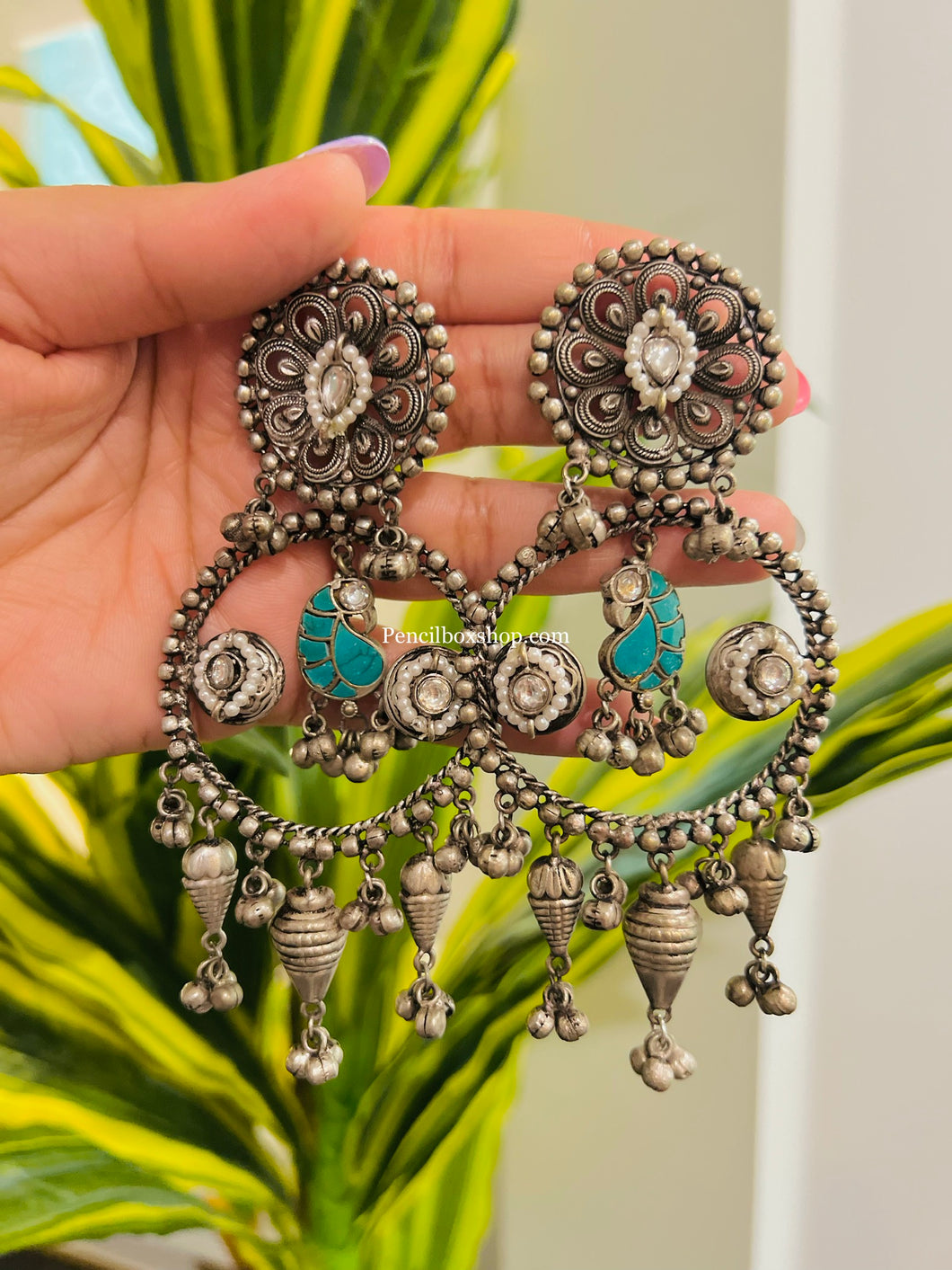 92.5 Silver Coated Turquoise Peacock Ghunghroo Jhumka earrings