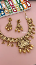 Load image into Gallery viewer, Golden Matte finish Ganesha Premium Quality Lakshmi ji Temple Jewelry Necklace set
