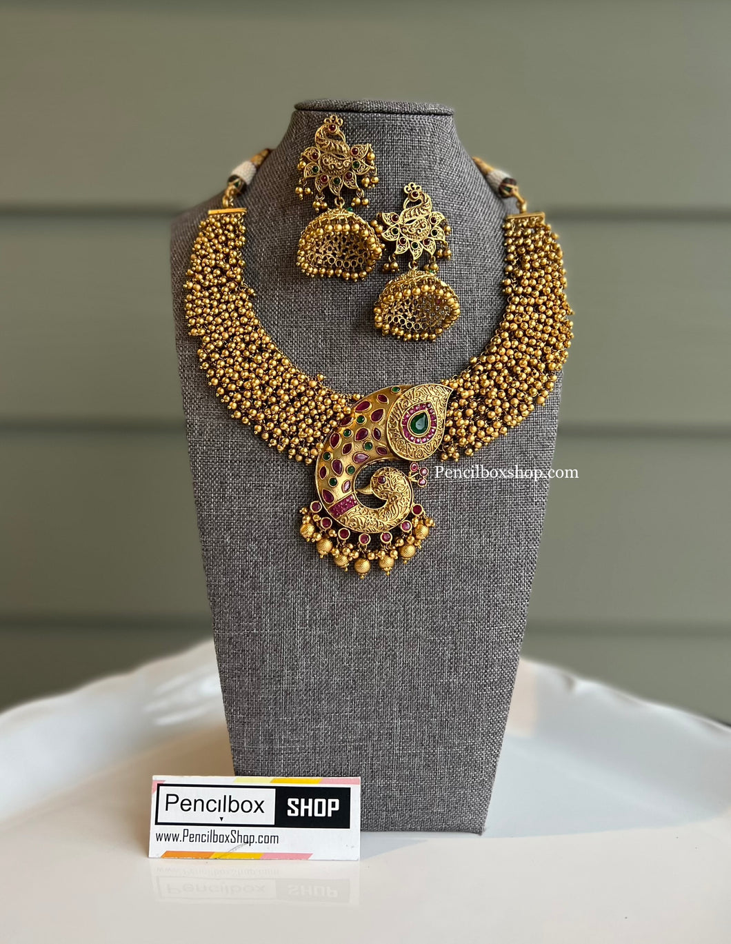 Tahira Multicolor Kemp Stone Kundan Golden Designer Necklace set