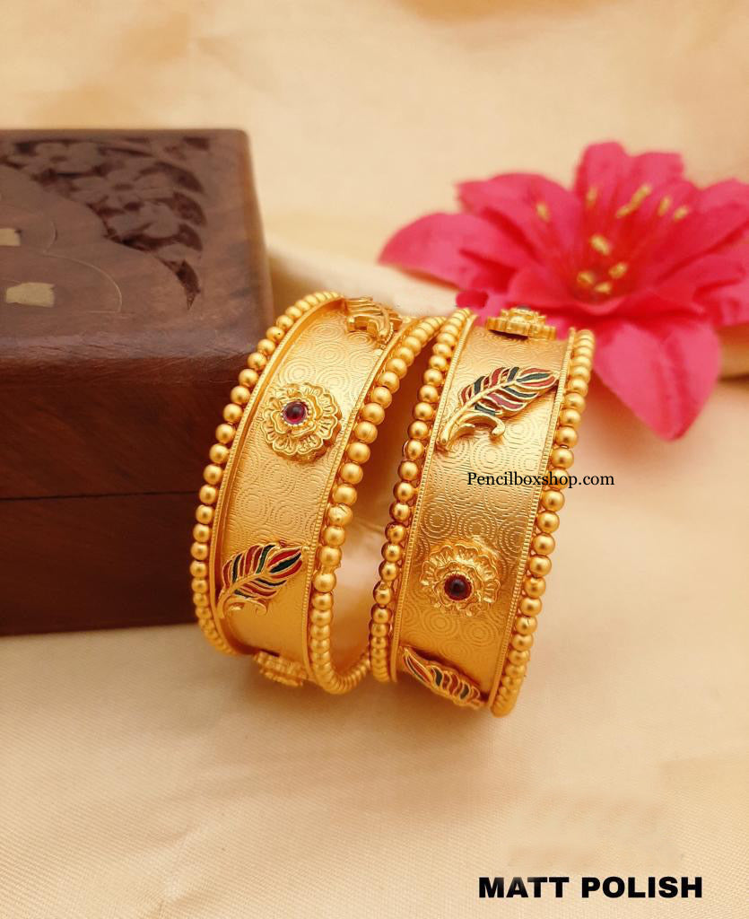 Golden matte finish leaf ruby green bangle set