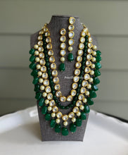Load image into Gallery viewer, Green Four layered Pearl Drops Heavy designer Kundan Necklace set

